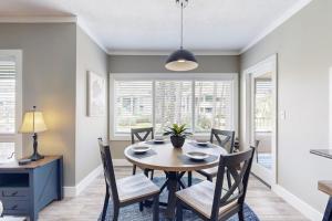 a dining room with a table and chairs at Anchorage 7473 in Hilton Head Island