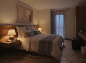 a bedroom with a large bed and a window at Zen Cove Villa - 5-Min Walk to Zen Beach, Srithanu in Haad Chao Phao