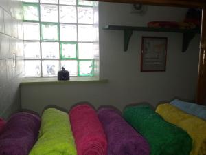 A bed or beds in a room at La Casa di Chico