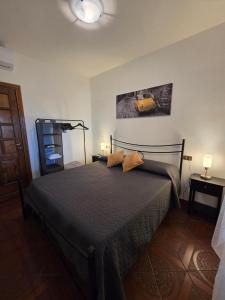 a bedroom with a bed with two pillows on it at Il Casaletto di Simeone in Amelia +2 photos