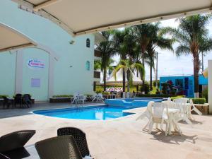 Piscina a Hotel Splash Inn o a prop