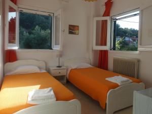 Postel nebo postele na pokoji v ubytování Konstantina Apartment
