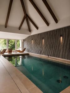 a swimming pool in a house at Generalis Wine Hotel in Tokaj