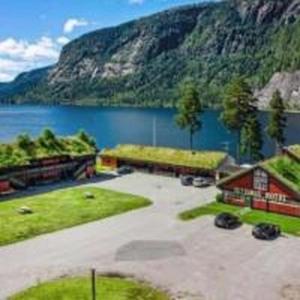 a view of a body of water with a mountain at Setesdal Motel & Apartments in Bygland