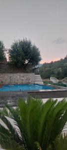 a swimming pool with a goal and a volley ball at Villa AS sa bazenom na Jablaničkom jezeru in Konjic