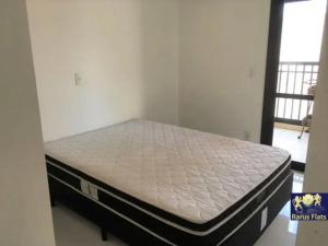 a large bed in a room with a mattress at Apt 2019 in Paulínia