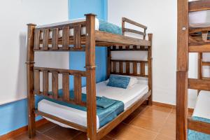 a bunk bed room with two bunk beds at Casa Blanca in Santa Marta