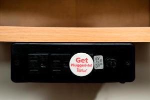 a black object with a sticker on a shelf at Red Roof Inn Manchester, TN in Manchester