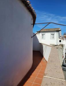 a view from the balcony of a house at Ductus Aquae House in Évora