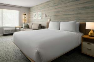 a large white bed in a hotel room at TownePlace Suites by Marriott Seekonk in Seekonk +26 photos