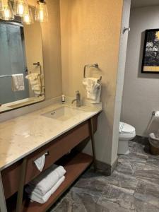 a bathroom with a sink and a toilet at Primm Valley Hotel & Casino in Jean
