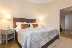 Cama o camas de una habitación en Elite Hotel Adlon