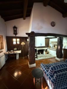 a living room with a couch and a table at Paco d'Anha in Viana do Castelo
