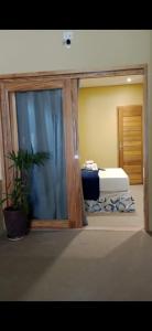 a small bedroom with a bed in a room at Pousada Numei de Jeri in Jericoacoara +46 photos