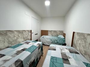 a bedroom with two beds in a room at Lunar Lua Nova 06 in Aracaju +22 photos