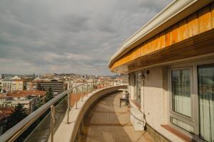 a balcony with a view of a city at saffari otel in Ankara