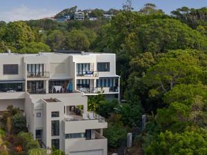an aerial view of a white apartment building at Villa Mariposa in Coolum Beach