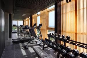 a fitness room with a gym with weights at TUI BLUE Tuy Hoa - Wellness & Retreat Hotel in Tuy Hoa