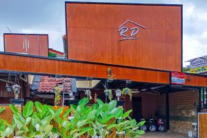 a building with the number on the side of it at Roemah Djogja Inn Seturan Raya RedPartner in Seturan