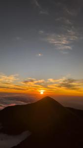 a sunset from the top of a mountain at O-t on the rise in Tweedside