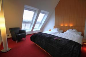Ein Bett oder Betten in einem Zimmer der Unterkunft Hotel Antoniushütte