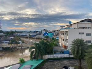 a view of a city with a river at Panatara Chumphon in Chumphon