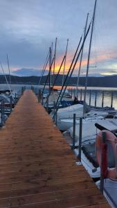 a dock with boats docked in the water at Apfelblüte in Stockach