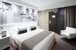 Ein Bett oder Betten in einem Zimmer der Unterkunft Catalonia Avinyo