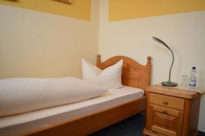 Postel nebo postele na pokoji v ubytování Hotel Seehalde