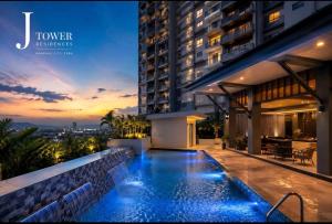 a swimming pool on the side of a building at Jtower residences mandaue 27flr in Mandaue City