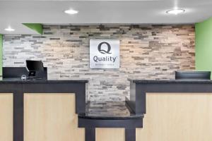a lobby of a quality clinic with a stone wall at Quality Inn Walterboro I-95 in Walterboro +41 photos