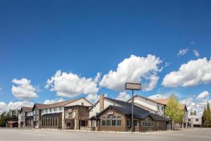 a building on the corner of a street at Starlite Yellowstone, Tapestry Collection by Hilton in West Yellowstone