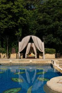 a tent is set up next to a swimming pool at Grand Hyatt Istanbul in Istanbul