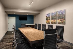 a conference room with a wooden table and chairs at Hampton Inn Morristown in Morristown +12 photos