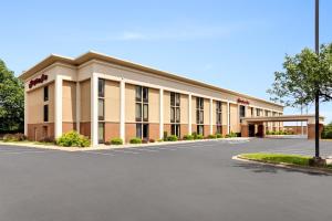 a hotel with a parking lot in front of it at Hampton Inn Springfield-South in Springfield