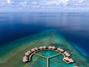an aerial view of a resort in the ocean at V Villas Maldives at Mirihi - MGallery Collection in Mandhoo +203 photos