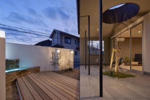 唐津市にある水響邸-blue sound villa-の木製デッキのある家の2つの眺め