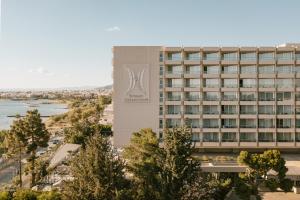 a rendering of a hotel with a view of the ocean at Divani Apollon Palace & Thalasso in Athens