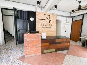 a lobby with a sign that reads lease aborigination at Sukhum Ratchada Sutthisan in Bangkok