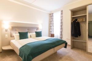 Postel nebo postele na pokoji v ubytování Hermes Hotel Oldenburg
