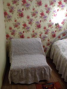 Кровать или кровати в номере Apartment on Krasnoarmeyskaya 9