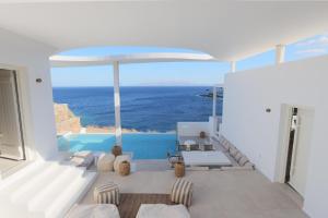 a villa with a view of the ocean at Three Drops in Kanala