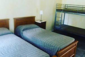 Posteľ alebo postele v izbe v ubytovaní Apartment Piccolo Borgo