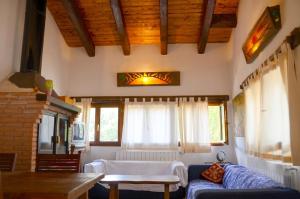a living room with a couch and a table at Spacious Apartment in Yeste with Shared Pool in Yeste