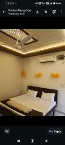 a picture of a bedroom with a bed in a room at A7 hotel in Khanna
