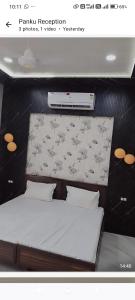 a picture of a bedroom with a bed at A7 hotel in Khanna