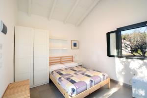 Katil atau katil-katil dalam bilik di Villaggio Turistico Elea