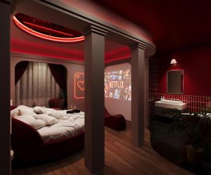 a bedroom with a bed with a red ceiling at Sanora Hotel in Hanoi
