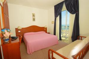Postel nebo postele na pokoji v ubytování Hotel Beny + 37 fotografií