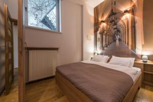 Posteľ alebo postele v izbe v ubytovaní Krakow For You Main Square Apartments